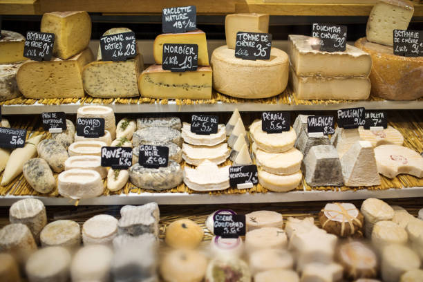 Different type of cheese in store, Paris, France stock photo