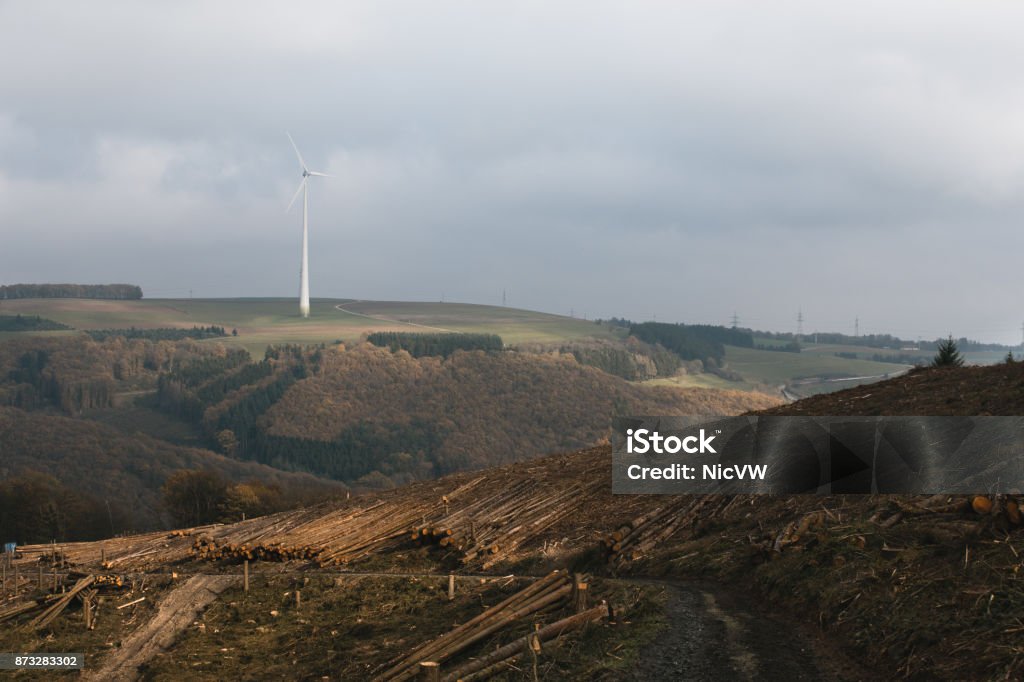 Windmill and trunks. Global warming Agriculture Stock Photo