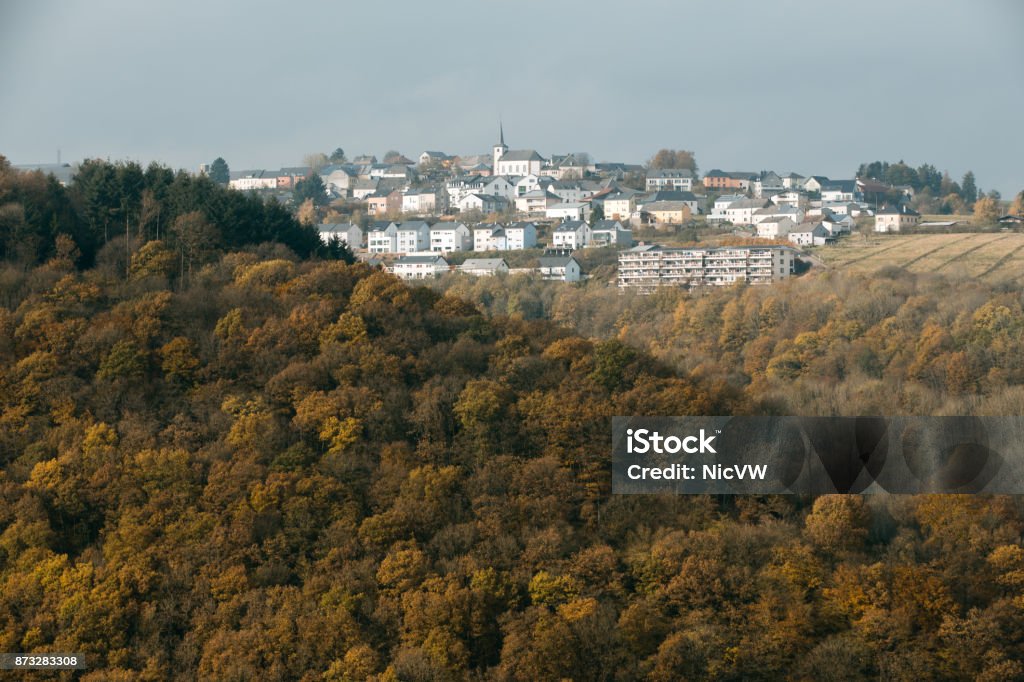 Bourscheid village on the hill with autumn colors Architecture Stock Photo