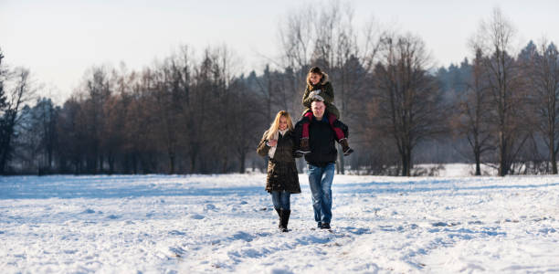 istock Family on snow 873286188