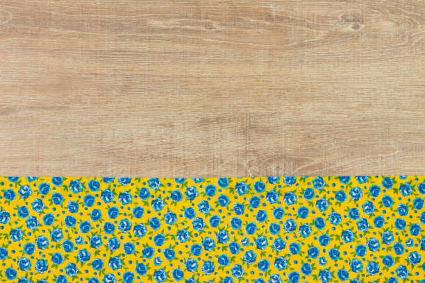 istock Pattern flower cloth napkin on empty wooden background. 873286626