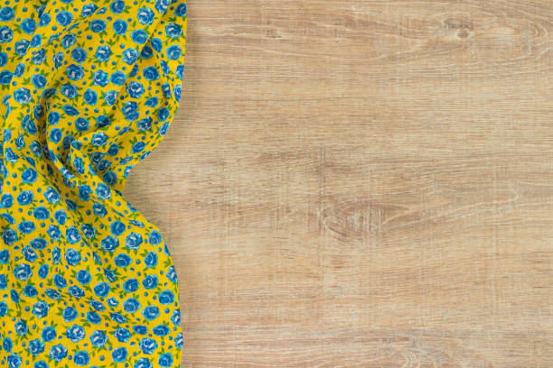 istock Pattern flower cloth napkin on empty wooden background. 873286666