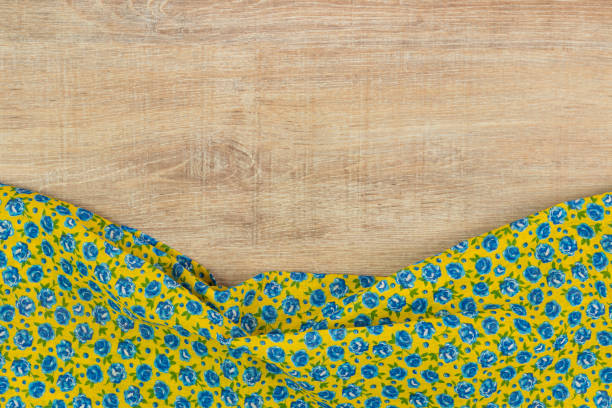 istock Pattern flower cloth napkin on empty wooden background. 873286704