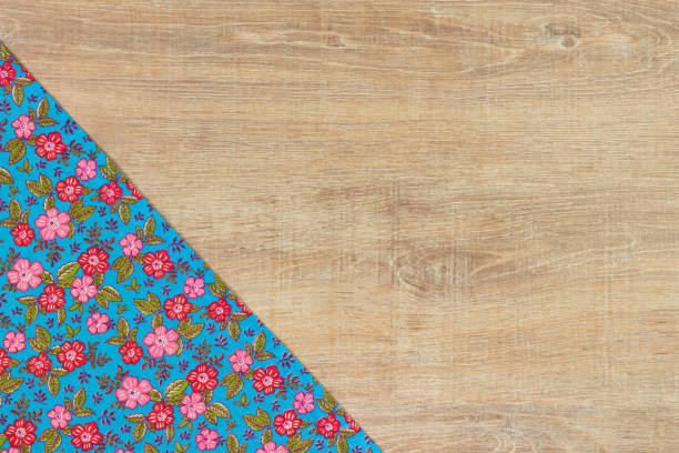 istock Pattern flower cloth napkin on empty wooden background. 873286752