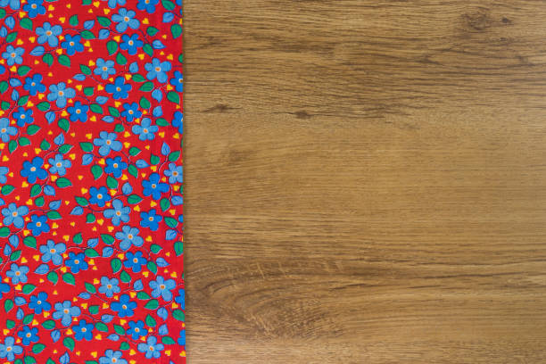 istock Pattern flower cloth napkin on empty wooden background. 873289720