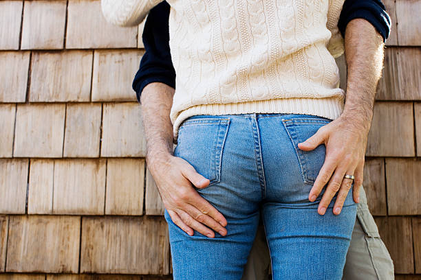 Hands on buttocks  man touching womans buttock stock pictures, royalty-free photos & images