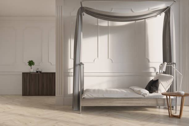 istock White wooden bedroom with a single bed 873311696