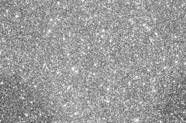 istock glittery  background perfect vivid silver 873315240