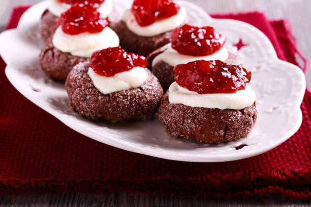istock Chocolate, jam and cream thumbprints cookies 873315666