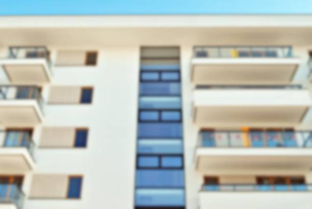 istock New apartment buildings blurred background 873316196