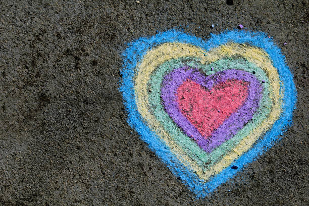 istock chalk drawing: colorful hearts on asphalt 873333074