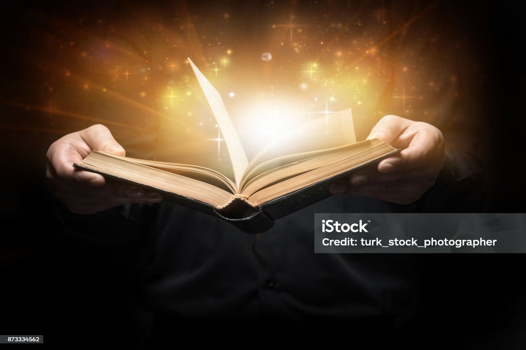 Man reads a book Man reads a book high quality and high resolution studio shoot Open Stock Photo