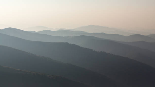 istock Silhouettes of mountain peaks 873335700
