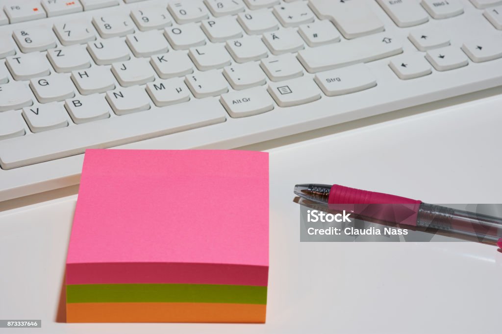 Post Notes On Computer Post It Sticky Note With Pen And White Computer Keyboard Stock Photo ...