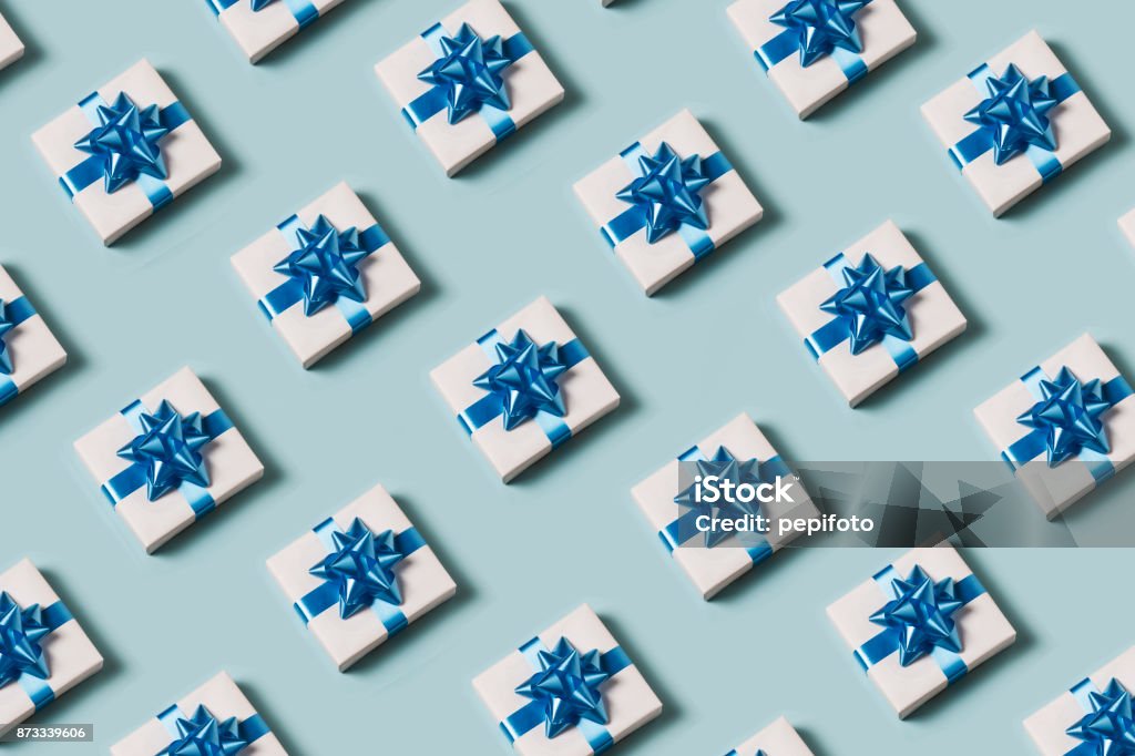 Present on blue background Gift Stock Photo