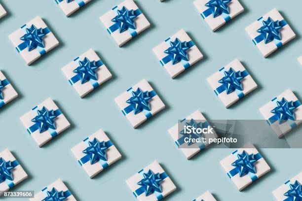 Present On Blue Background Stock Photo - Download Image Now - Gift, Blue, Backgrounds