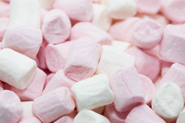 istock Macro shot of some pink and white marshmallows 873340586