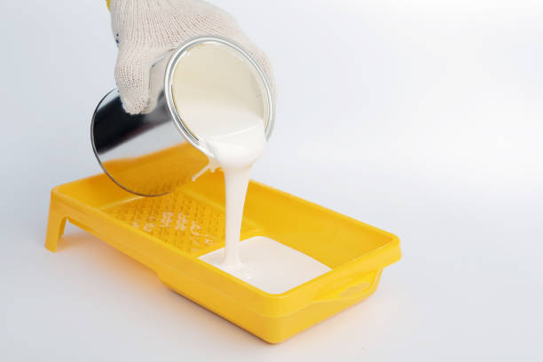istock Pouring paint into a painting tray 873341378