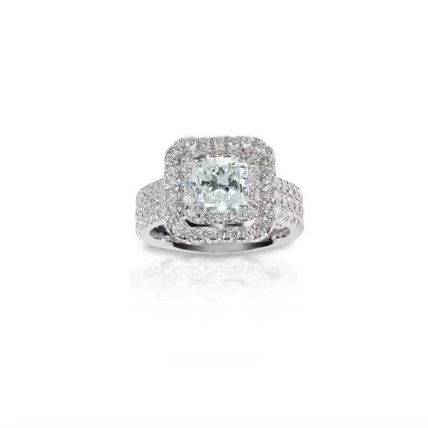 Beautiful Diamond Engagment ring. Gemstone square princess cut surrounded by two halo of diamonds.