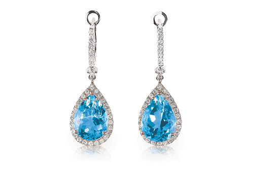 Opened blue Jewelry gift box with Jewelry, isolated on white with clipping path.