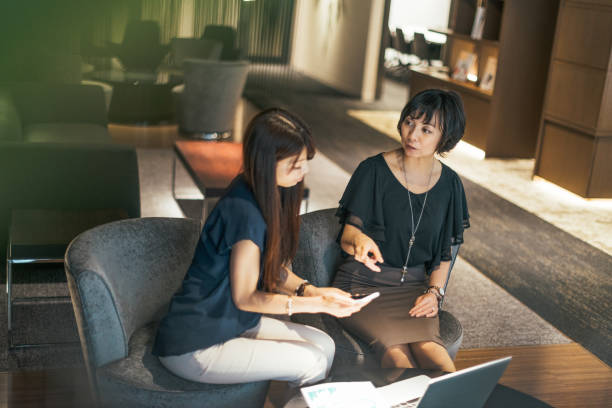 istock Authorized representative form Japanese inusrance company visiting client at home 873370672