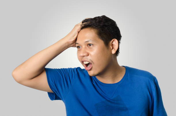 istock Asian man isolated on gray background 873375324