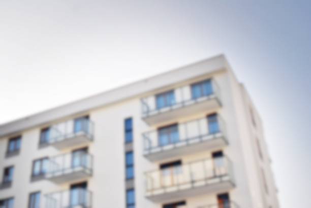 istock New apartment buildings blurred background 873375352