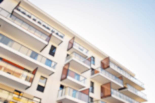 istock New apartment buildings blurred background 873377884