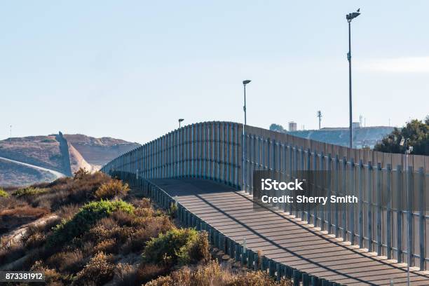 Section Of International Border Wall Between San Diegotijuana Stock Photo - Download Image Now