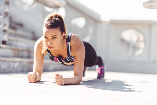 istock fitness woman on a plank pose 873382130