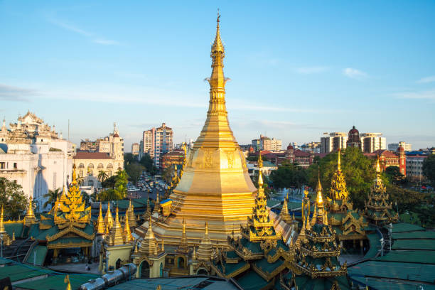 Scenery view of Sule pagoda one of an iconic Buddhist landmark in the centre of Yangon township of Myanmar. The Sule Pagoda is located in the heart of Yangon at the meeting point between sule Pagoda road and the Mahabandoola road. sule pagoda stock pictures, royalty-free photos & images