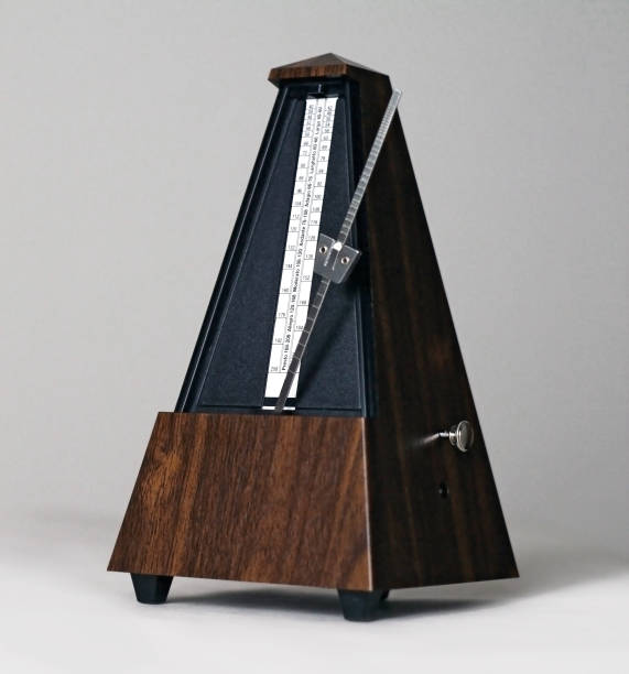 istock Metronome in action isolated and on a plain background 873395832