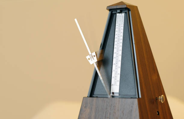 istock Metronome in action isolated and on a plain background 873395838