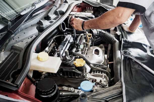 istock Mechanic working and repair car in car service centre 873399322