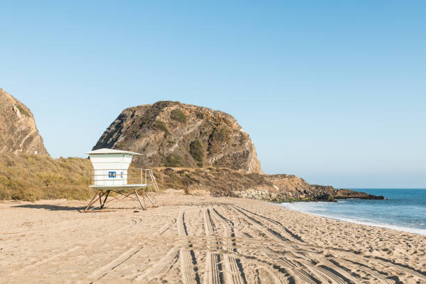 istock Lifeguard Tower at Point Mugu State Park with Mugu Rock on PCH 873406576