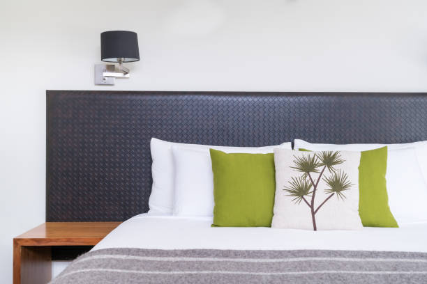 istock Close up bed headboard design in bedroom interior 873418840