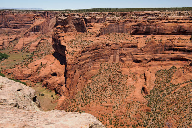 Spider Rock Overlook, Canyon de Chelly National Monument Downstream view towards Face Rock from Spider Rock Overlook at the end of the South Rim Drive of Canyon de Chelly National Monument in Apache County near Chinle, Arizona, USA chinle arizona stock pictures, royalty-free photos & images