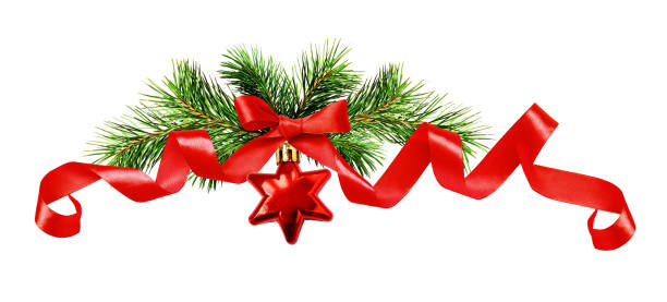 istock Christmas tree twigs, red star and silk ribbon bow 873435932