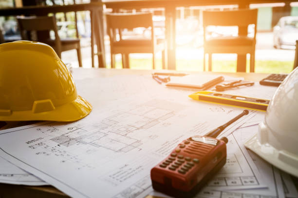 istock Vintage business desk of engineer contractor. 873445256