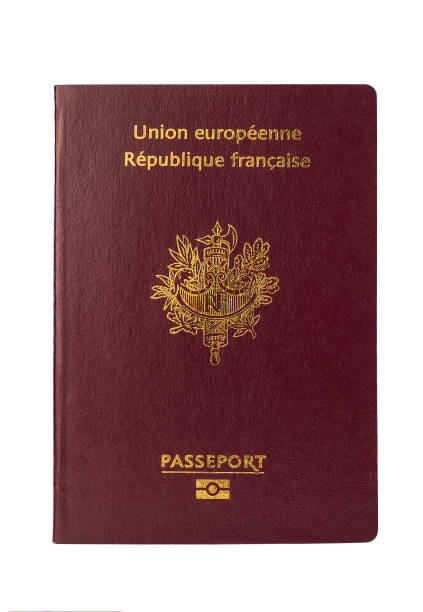 istock French European passports and plane on a white background 873448676