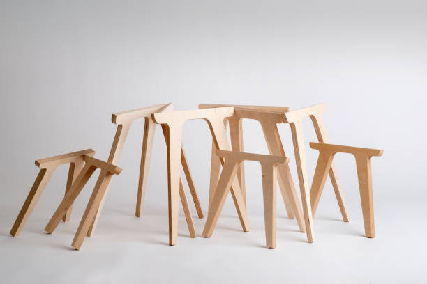 istock Wooden Table Legs of Various Sizes on Gray Background 873449118