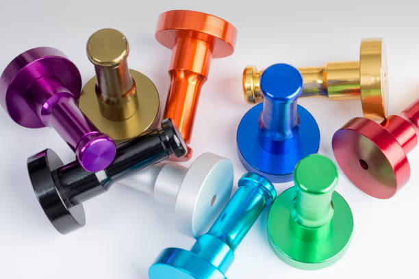 istock Aluminum Pegs of Different Colors on White Background 873449142