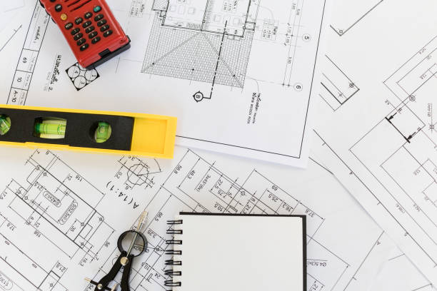 istock Vintage business desk of engineer contractor. 873451840