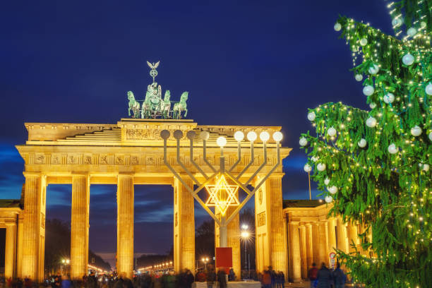 istock Brandenburg gate and christmas tree 873455226