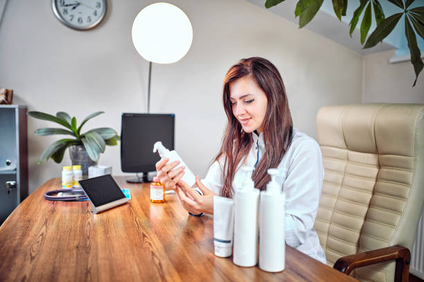 istock The cosmetologist is caring for the patient's face 873455246