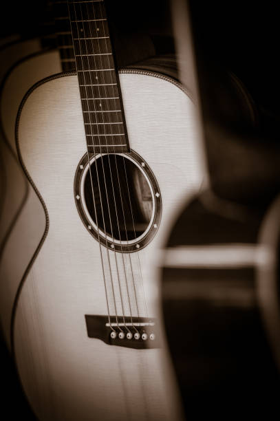 istock Acoustic classical guitars with strings in shop, France 873457736
