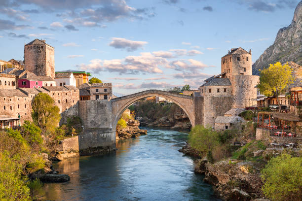 Mostar bridge in the town of Mostar in Bosnia and Herzegovina. View over the Mostar Bridge known also as Stari Most in Mostar, Bosnia and Herzegovina. mostar stock pictures, royalty-free photos & images