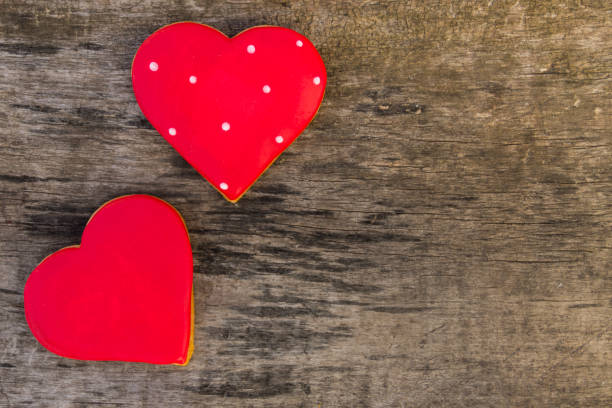istock Heart shaped cookies for valentine day on rustic wooden table 873459098