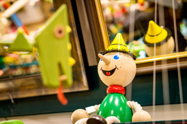 istock Wooden toy on a store shelf. 873462546