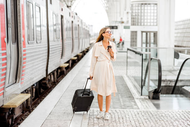 istock Woman at the railway station 873468794